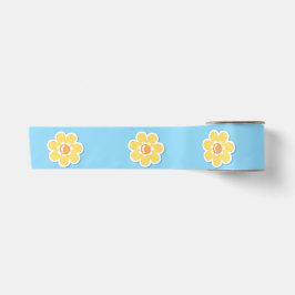 Lentemadeliefjes op pastelblauw satijnen lint