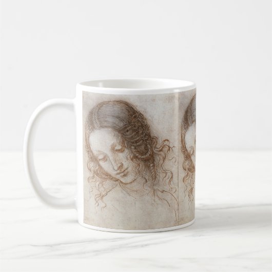 Leonardo da Vinci's Studie van Leda's hoofd Koffiemok (Links)
