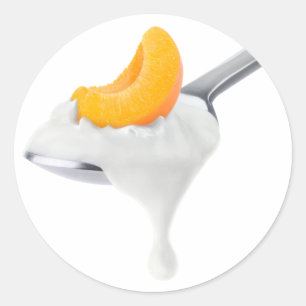 Lepel van perzik of abrikozenyoghurt ronde sticker