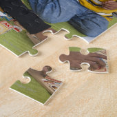 Leraar met peuter overdag legpuzzel (Zijkant)