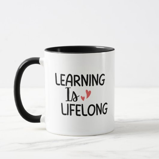 'Leren is Levenslang' cadeau voor docenten als bed Mok (Links)