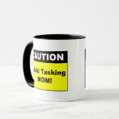 Let op de waarschuwing voor multi-tasking mam mok (Voorkant links)