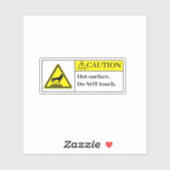 Let op het label voor warm oppervlak (Vel)