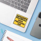 Let op: hoge druk lucht sticker (Laptop met iPhone)