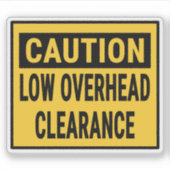 Let op: lage overheadklaring sticker (Voorkant)
