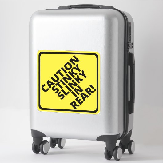 Let op Stinky Slinky achterin! Sticker (Koffer)
