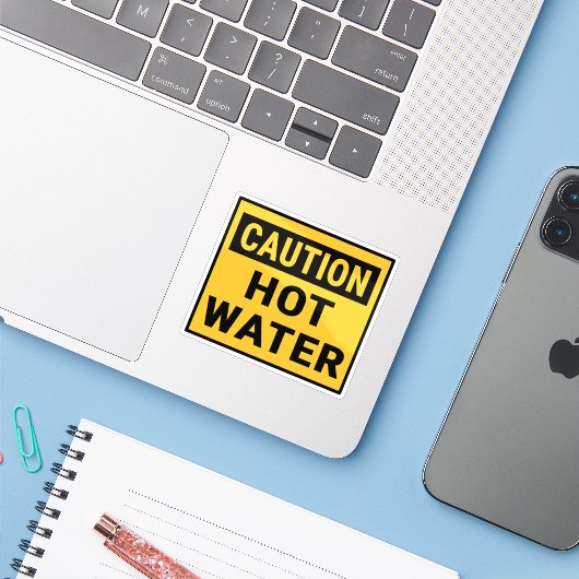 Let op warm water sticker (Laptop met iPhone)