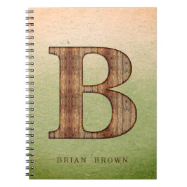 Letter B-houtkorrel op groene beige grunge Notitieboek