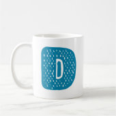 Letter D-ontwerp. Koffiemok (Links)