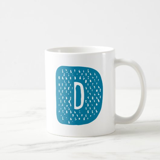 Letter D-ontwerp. Koffiemok (Rechts)