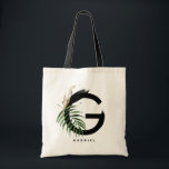 Letter G Monogram | Tropische lederen op maat Tote Bag<br><div class="desc">letter G monogram canvas tas met waterverf tropisch blad,  faux goudblad en zwarte waterverf borstelaccenten. Pas deze tropische monogram canvas tas aan door jouw naam of andere details toe te voegen. Deze boho letter G monogram canvas tas zal perfect zijn als geschenk. Andere brieven zijn beschikbaar.</div>