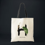 Letter H-monogram | Tropische bladeren bruidsmeisj Tote Bag<br><div class="desc">Aanpasbaar letter H-monogram boodschappentas met waterverf tropisch palmblad,  namaak goudkleurige folieblad en zwarte waterverfakcenten. Personaliseer deze tropische monogramtas door uw naam of andere details toe te voegen. Deze boho-letter H-monogramtas is perfect als cadeau. Andere letters zijn beschikbaar.</div>