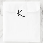 Letter K White Rock Salt Alphabet van Janz Ronde Sticker (Tas)