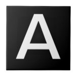 Letter-tegels Tegeltje<br><div class="desc">Keramische lettertegels.  Schrijftegels boven of onder het hoesje.  U past de letter of letters aan die u nodig hebt voor uw keramische tegels of mozaïekteken.  Letterborden voor weerbestendige borden,  huisnummers.  Wit op zwarte achtergrond.</div>