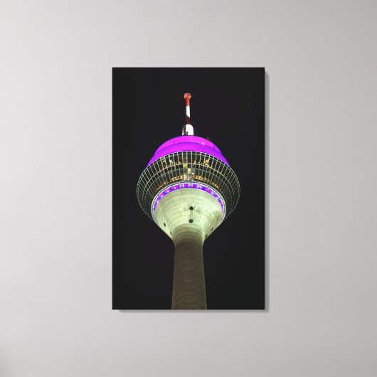 Leuchtender Düsseldorfer Rheinturm bei Nacht Canvas Afdruk (Voorkant)