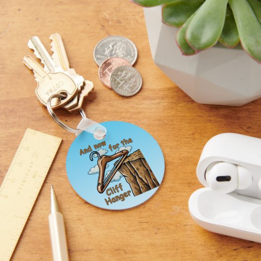 Leuk Afbeelding van Cliff Hanger met Speelse Wordp Sleutelhanger (Bureau)