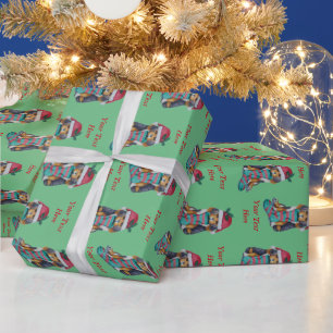 leuk zwart en bruin puppy met Kerstmiskous Cadeaupapier