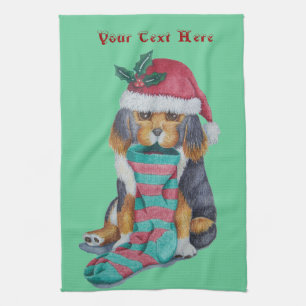 leuk zwart en bruin puppy met Kerstmiskous Theedoek