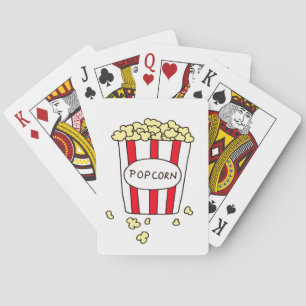 Leuke bioscoopzoutjes in een rode witte emmer pokerkaarten