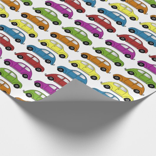 Leuke compacte auto's in retro-stijl in kleurrijen cadeaupapier (Hoek)