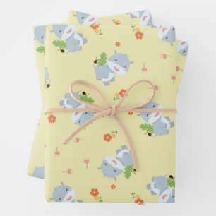 Leuke gelukkige nijlpaard met gele bloemen inpakpapier vel
