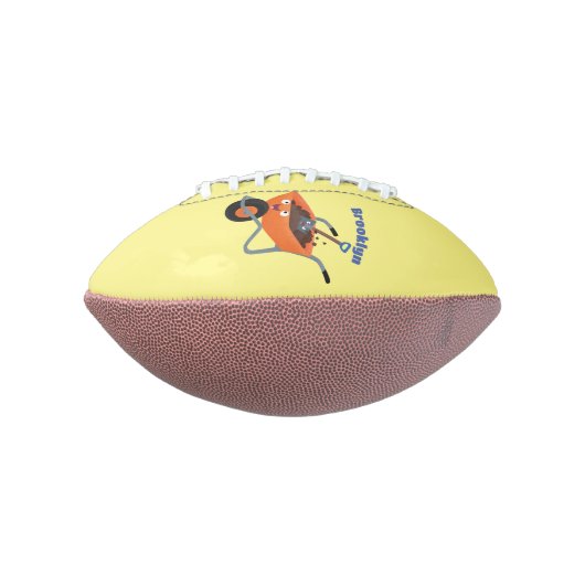 Leuke gelukkige oranje kruiwagen cartoon illustrat american football (Gedraaid 90)