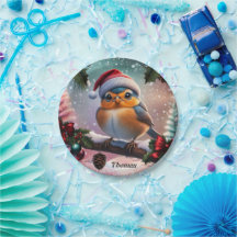 Leuke kerstvogel zittend op een tak
