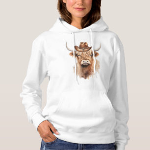 Leuke koe met een pet hoodie