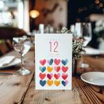 Leuke liefde harten Tafel Nummer Zitkaart Kaart<br><div class="desc">Voeg een vleugje plezier en liefde toe aan uw huwelijksreceptie met onze Fun Love Hearts Table Number-zitgrafiek. Deze charmante zitkaart heeft een speels design met een assortiment kleurrijke liefdesharten, waardoor een vrolijke en levendige sfeer ontstaat voor uw gasten. Met de kaart kunt u tabelnummers toewijzen en weergeven, waardoor een soepele...</div>