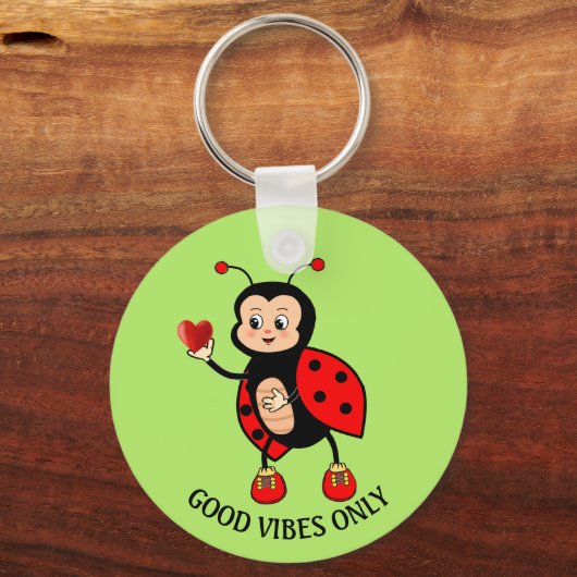 Leuke lieveheersbeestje en hart op groen sleutelhanger (Achterkant)