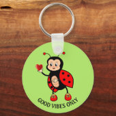 Leuke lieveheersbeestje en hart op groen sleutelhanger (Voorkant)