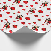 Leuke lieveheersbeestjes op wit cadeaupapier (Hoek)