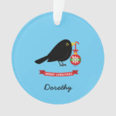Leuke merel met een kerstbal aangepaste naam ornament (voorkant)