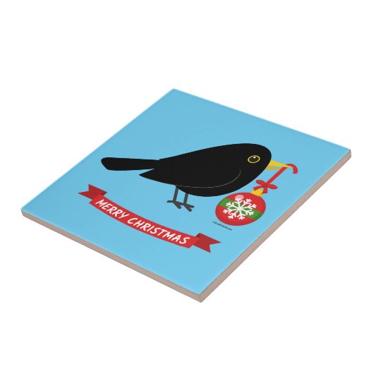 Leuke merel met een kerstbal tegeltje (Zijkant)