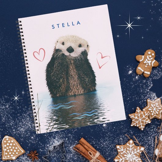 Leuke otter in vijver met roze achtergrond en hart notitieboek
