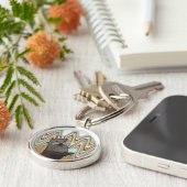 Leuke otter met ijs op wervelachtergrond sleutelhanger (Zijkant)