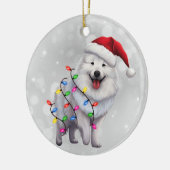Leuke Samoyed hond verpakt in kerstverlichting Keramisch Ornament (Links)
