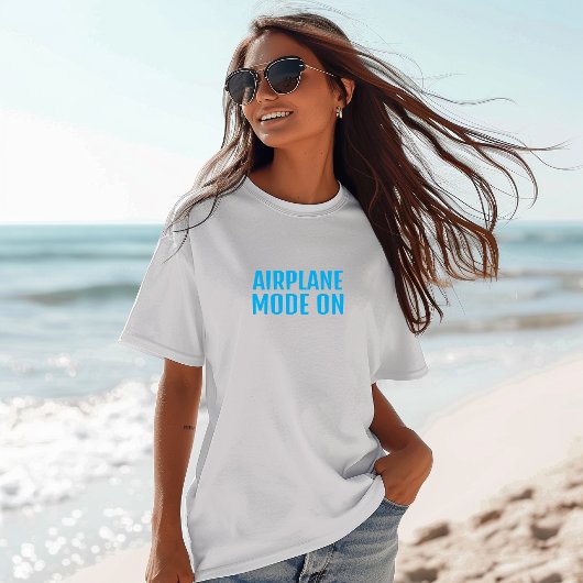 Leuke wandelshirt vliegtuigstand aan turquoise t-shirt