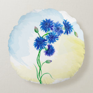 Leuke waterverf korenbloemen op blauwe en gele rug rond kussen