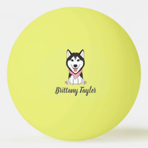 Leuke zwarte en witte husky hond pingpongbal