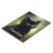 Leukste zwarte katje met blauwe aanpasbare ogen notitieboek (Linkerzijde)