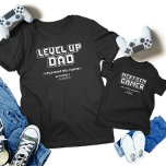 Level Up Gamer Papa Kind Next Gen Speler Matching Kinder Shirts<br><div class="desc">Vier de ultieme gameband met onze "Gamer Dad & Next Gen Player" bijpassende t-shirts! Met retro design "Level Up Dad" en "Next Gen Gamer" zijn deze shirten ideaal voor Vaderdag, verjaardagen of een game-evenement. Show uw gedeelde passie met gedurfde, pixelvormige afbeeldingen. Ideaal voor gamer vaders en hun kinderen, deze t...</div>