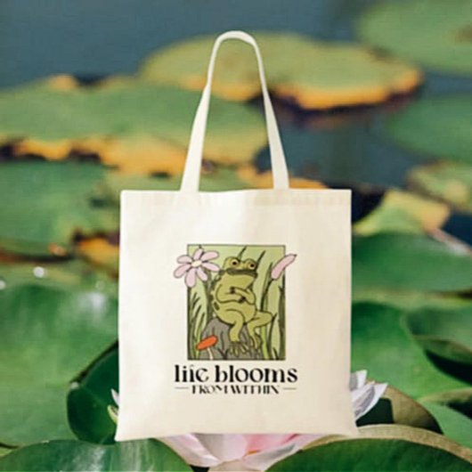 Leven bloeit van binnenuit tote bag