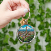 Levend stadslandschap met wolkenkrabber sleutelhanger (Hand)