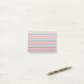 Levende koraal-, blauwe en grijze strepen post-it® notes (Op bureau)