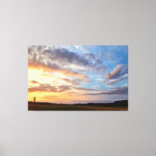 Levende zonsondergang boven open veld 1 canvas afdruk (Voorkant)