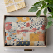 Levendig bloempatjesspatchworkdekbed in warme tint tissuepapier (Geschenk)