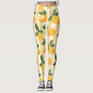 Levendig citrusvruchtenpatroon met groene bladeren leggings