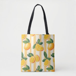 Levendig citrusvruchtenpatroon met groene bladeren tote bag