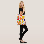 Levendig fruitpatroon tote bag (Op model)